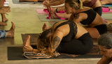 Group of women using Catalina straps during a yoga lesson